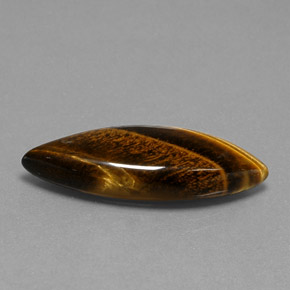 Tiger's Eye طبيعي بلون بني ذهبي، وزن ‎16.23‎ قيراط، شكل ماركيز، مقاس ‎31.4x11.8‎ مم