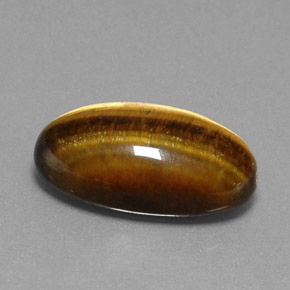 Tiger's Eye طبيعي بلون بني ذهبي، وزن ‎19.73‎ قيراط، شكل بيضاوى، مقاس ‎23.7x13.6‎ مم