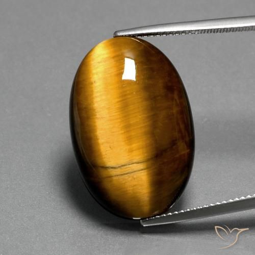 19.68ct طبيعي بنى متوسط عين النمر, بيضوي, غير شفاف