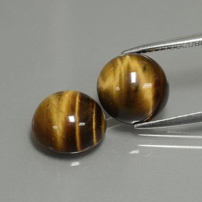 Tiger's Eye طبيعي بلون بني ذهبي، وزن ‎‎ قيراط، شكل دائري، مقاس ‎10.14‎ مم