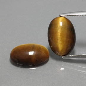 Tiger's Eye طبيعي بلون بني ذهبي، وزن ‎‎ قيراط، شكل بيضاوى، مقاس ‎14x10‎ مم