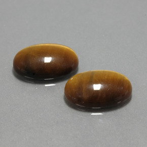 Tiger's Eye طبيعي بلون بني ذهبي، وزن ‎‎ قيراط، شكل بيضاوى، مقاس ‎14x10‎ مم