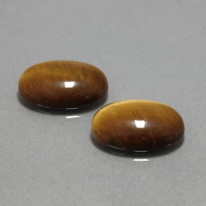 Tiger's Eye طبيعي بلون بني ذهبي، وزن ‎‎ قيراط، شكل بيضاوى، مقاس ‎14x10‎ مم