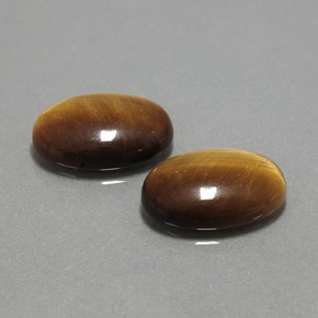 Tiger's Eye طبيعي بلون بني ذهبي، وزن ‎‎ قيراط، شكل بيضاوى، مقاس ‎14x10‎ مم