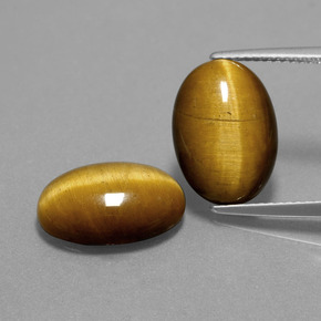 أحجار عين النمر ذهب البنى طبيعية، قصة بيضاوى، غير شفاف، وزنها  قيراط