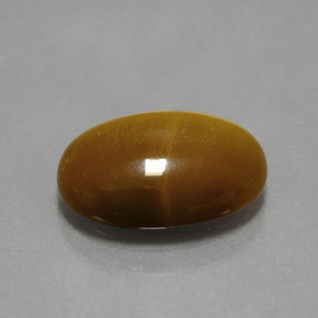Tiger's Eye طبيعي بلون بني ذهبي، وزن ‎4.49‎ قيراط، شكل بيضاوى، مقاس ‎14x10‎ مم