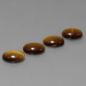 Tiger's Eye طبيعي بلون بني ذهبي، وزن ‎‎ قيراط، شكل بيضاوى، مقاس ‎14x10‎ مم
