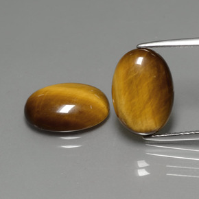 Tiger's Eye طبيعي بلون بني ذهبي، وزن ‎‎ قيراط، شكل بيضاوى، مقاس ‎14x10‎ مم