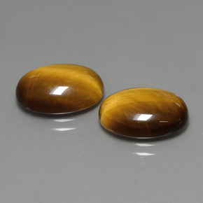 Tiger's Eye طبيعي بلون بني ذهبي، وزن ‎‎ قيراط، شكل بيضاوى، مقاس ‎14x10‎ مم