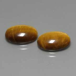 Tiger's Eye طبيعي بلون بني ذهبي، وزن ‎‎ قيراط، شكل بيضاوى، مقاس ‎14x10‎ مم