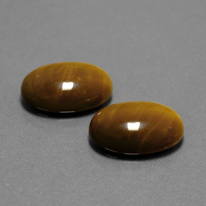 Tiger's Eye طبيعي بلون بني ذهبي، وزن ‎‎ قيراط، شكل بيضاوى، مقاس ‎14x10‎ مم