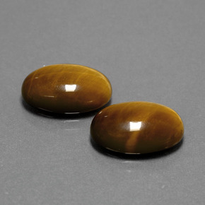 Tiger's Eye طبيعي بلون بني ذهبي، وزن ‎‎ قيراط، شكل بيضاوى، مقاس ‎14.1x10‎ مم
