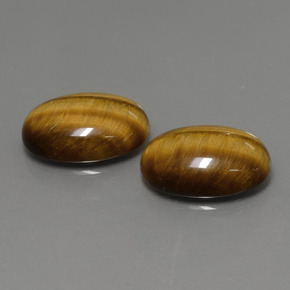 Tiger's Eye طبيعي بلون بني ذهبي، وزن ‎‎ قيراط، شكل بيضاوى، مقاس ‎14x10‎ مم