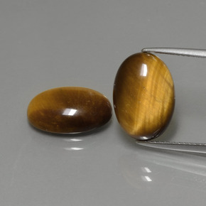 Tiger's Eye طبيعي بلون بني ذهبي، وزن ‎‎ قيراط، شكل بيضاوى، مقاس ‎14x10‎ مم