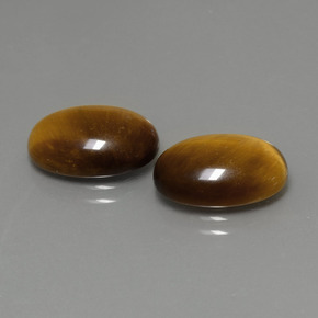 Tiger's Eye طبيعي بلون بني ذهبي، وزن ‎‎ قيراط، شكل بيضاوى، مقاس ‎14x10‎ مم