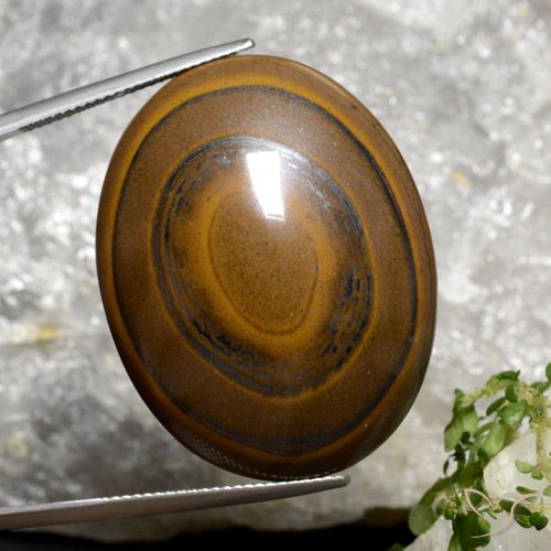 Tiger's Eye طبيعي بلون بنى الأرز، وزن ‎89.36‎ قيراط، شكل بيضاوى، مقاس ‎34.7x27.1‎ مم