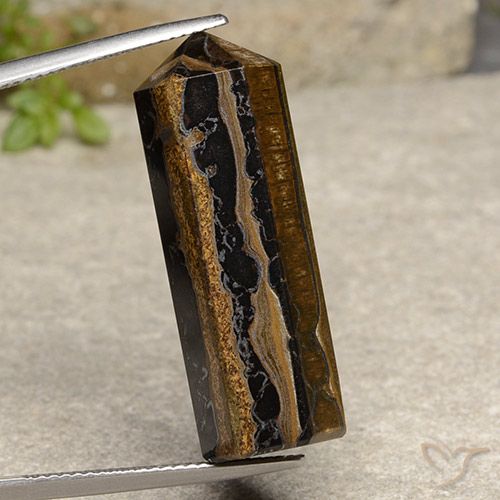 عين النمر بنى دافئ طبيعي، شكل خيالي، 32.91 قيراط، غير شفاف