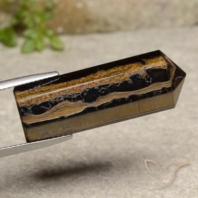 عين النمر بنى دافئ طبيعي، شكل خيالي، 32.91 قيراط، غير شفاف