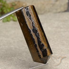 عين النمر بنى دافئ طبيعي، شكل خيالي، 32.91 قيراط، غير شفاف