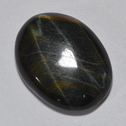 Tiger's Eye طبيعي بلون متعدد الألوان، وزن ‎11.75‎ قيراط، شكل بيضاوى، مقاس ‎18.2x13.9‎ مم