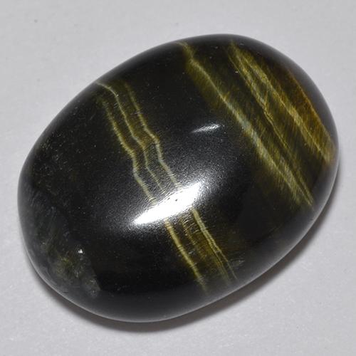 Tiger's Eye طبيعي بلون متعدد الألوان، وزن ‎19.06‎ قيراط، شكل بيضاوى، مقاس ‎19.4x14.6‎ مم