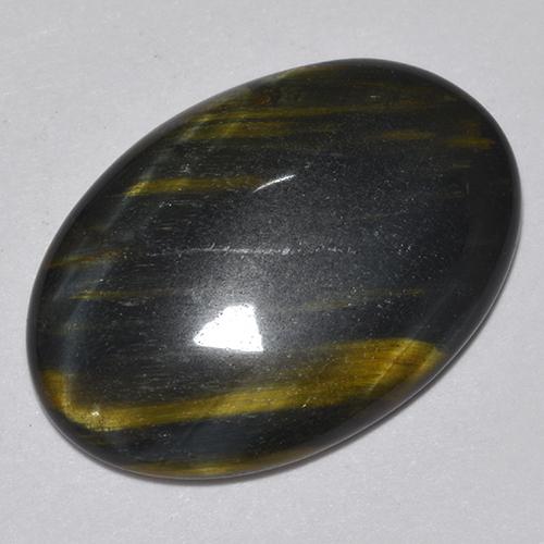Tiger's Eye طبيعي بلون متعدد الألوان، وزن ‎9.44‎ قيراط، شكل بيضاوى، مقاس ‎20.6x14.4‎ مم