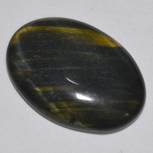 Tiger's Eye طبيعي بلون متعدد الألوان، وزن ‎9.44‎ قيراط، شكل بيضاوى، مقاس ‎20.6x14.4‎ مم