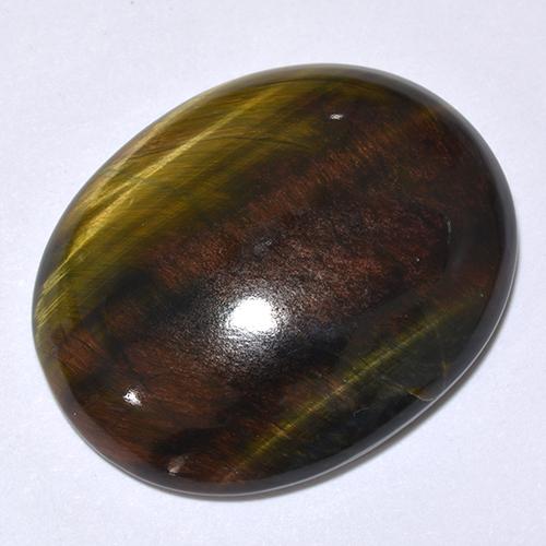 Tiger's Eye طبيعي بلون متعدد الألوان، وزن ‎24.66‎ قيراط، شكل بيضاوى، مقاس ‎25.3x20.2‎ مم