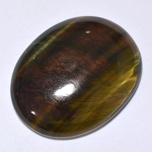 Tiger's Eye طبيعي بلون متعدد الألوان، وزن ‎24.66‎ قيراط، شكل بيضاوى، مقاس ‎25.3x20.2‎ مم