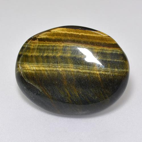 Tiger's Eye طبيعي بلون متعدد الألوان، وزن ‎12.92‎ قيراط، شكل بيضاوى، مقاس ‎19.8x15.7‎ مم