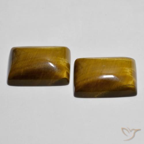 Tiger's Eye طبيعي بلون بني مصفر، وزن ‎26.73‎ قيراط، شكل باغيت، مقاس ‎18.2x13.3‎ مم