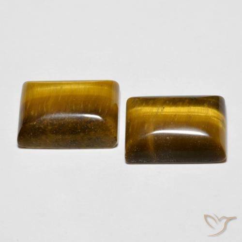Tiger's Eye طبيعي بلون بنى متوسط، وزن ‎16.01‎ قيراط، شكل باغيت، مقاس ‎14.3x10.3‎ مم