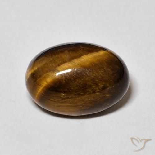 6.48ct طبيعي بني مصفر عين النمر, بيضوي, غير شفاف