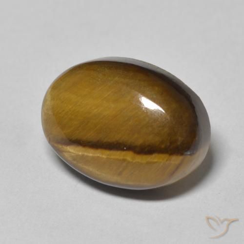 عين النمر Medium Light-Brown طبيعي، بيضوي، 7.09 قيراط، غير شفاف