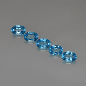 توباز طبيعي بلون أزرق سويسري، وزن ‎‎ قيراط، شكل بيضاوى، مقاس ‎7x5‎ مم