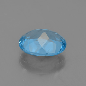 توباز طبيعي بلون أزرق سماوي، وزن ‎2.26‎ قيراط، شكل بيضاوى، مقاس ‎9.1x7.1‎ مم