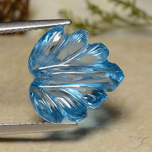 8.71ct طبيعي الأزرق السويسري توباز, قص وردة, شفاف