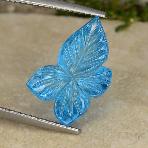 8.01ct طبيعي الأزرق السويسري توباز, قص وردة, شفاف