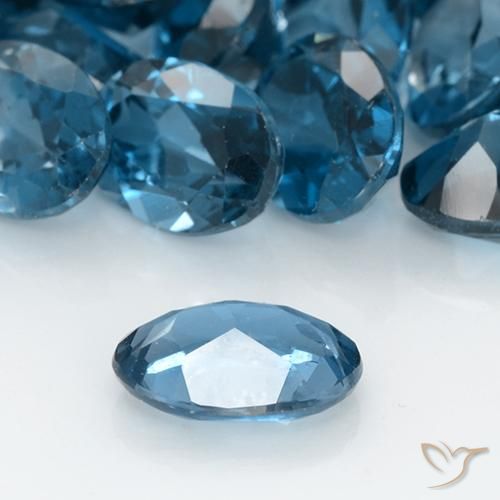 توباز أزرق لندنى طبيعي، بيضوي، 0.91 قيراط، VVS-VS
