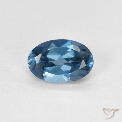 0.62ct طبيعي أزرق لندنى توباز, بيضوي, قليلا جدا