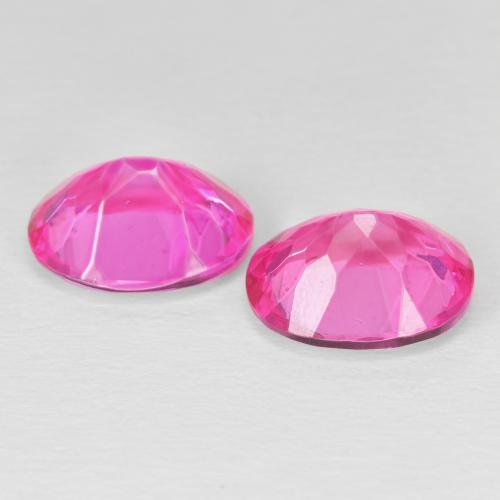 أحجار توباز Medium Dark-Pink طبيعية، بيضوي، VVS-VS، وزنها 8.64 قيراط
