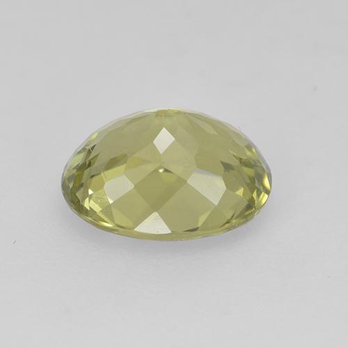 تورمالين طبيعي بلون Light Greenish Yellow ، وزن ‎1.25‎ قيراط، شكل بيضاوى، مقاس ‎7.6x6.1‎ مم