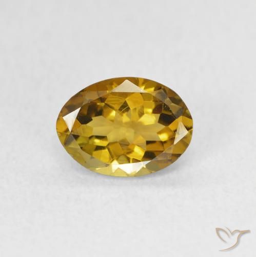0.96ct طبيعي بنى ذهبى مخضر تورمالين, بيضوي, قليلا جدا