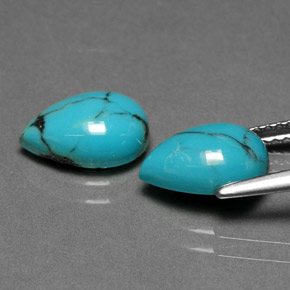 أحجار فيروزي أزرق طبيعية، شكل الكمثرى، غير شفاف، وزنها  قيراط