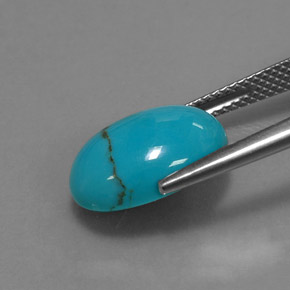 فيروز طبيعي بلون أزرق، وزن ‎3.62‎ قيراط، شكل بيضاوى، مقاس ‎13.9x9.8‎ مم