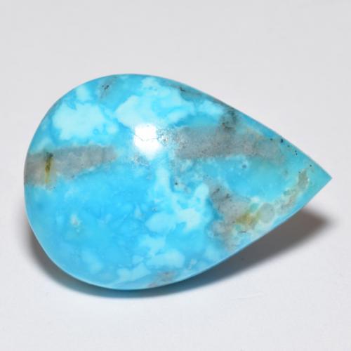 فيروز طبيعي بلون أزرق مخضر، وزن ‎14.11‎ قيراط، شكل شكل الكمثرى، مقاس ‎22.7x16‎ مم