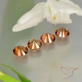 أحجار زركون Medium-Dark Orange  طبيعية، دائري، قليلا جدا، وزنها 3.73 قيراط
