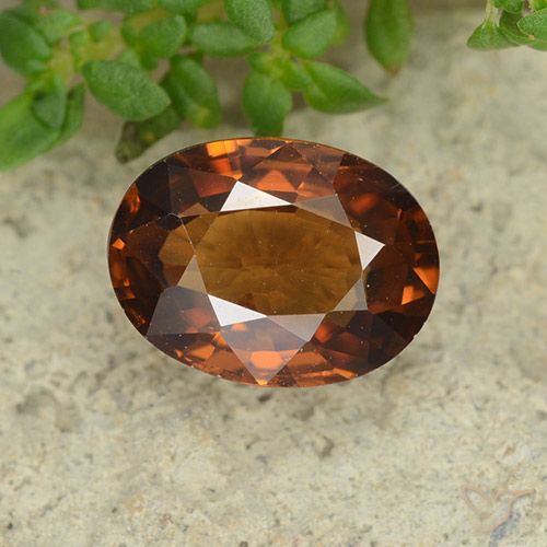 1.69ct طبيعي برتقالى داكن-متوسط زركون, بيضوي, قليلا جدا