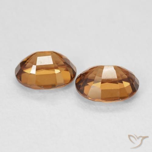 أحجار زركون Medium Dark-Orange طبيعية، بيضوي، VVS، وزنها 2.03 قيراط