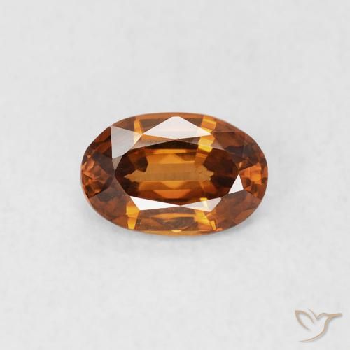 0.66ct طبيعي برتقالى ترابى زركون, بيضوي, قليلا جدا